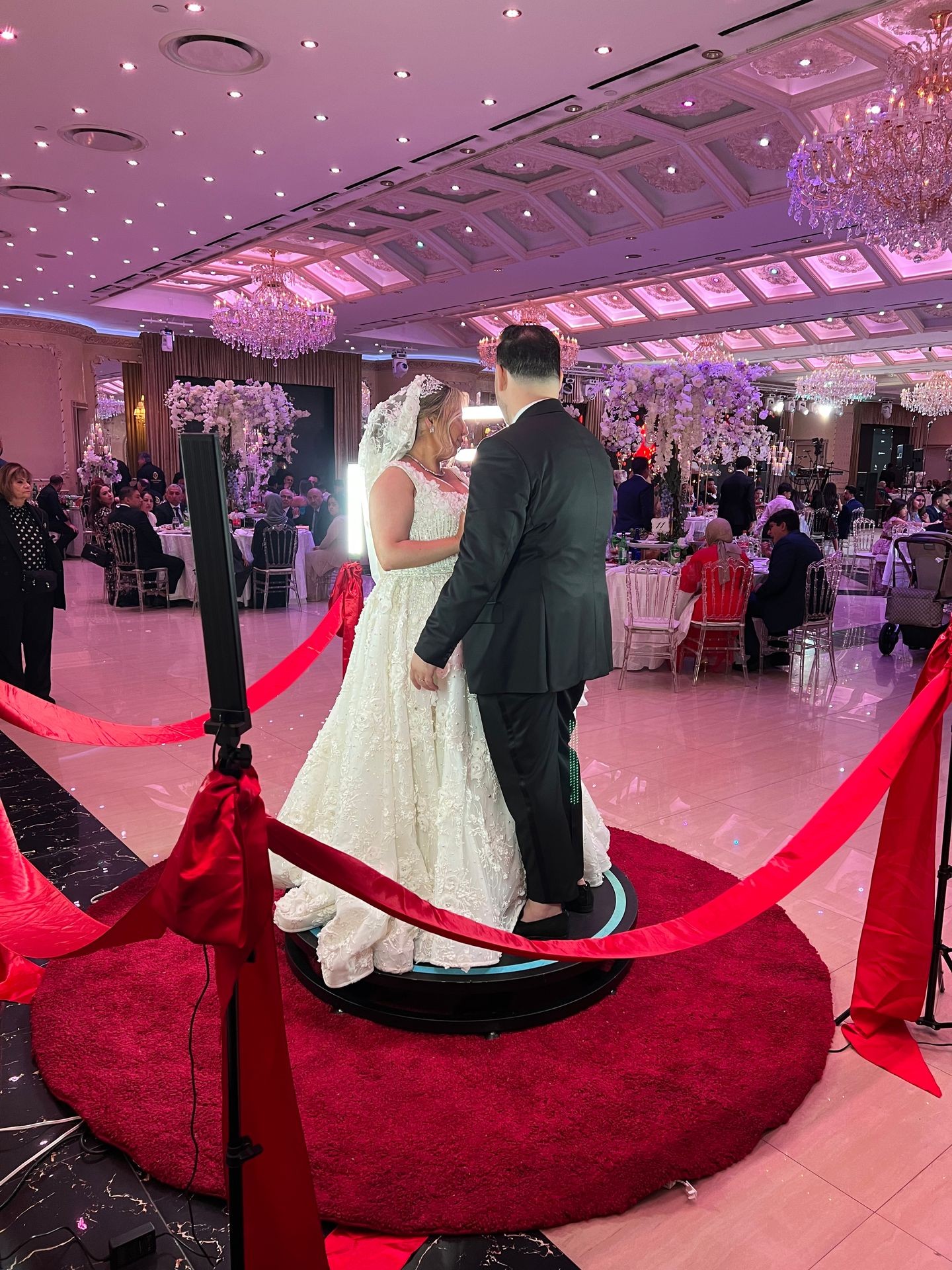 couple on a 360 video booth